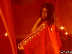 Dour Indian Babe in arms Strips